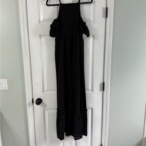 Gorgeous black dress with drip sleeves and eyelet details